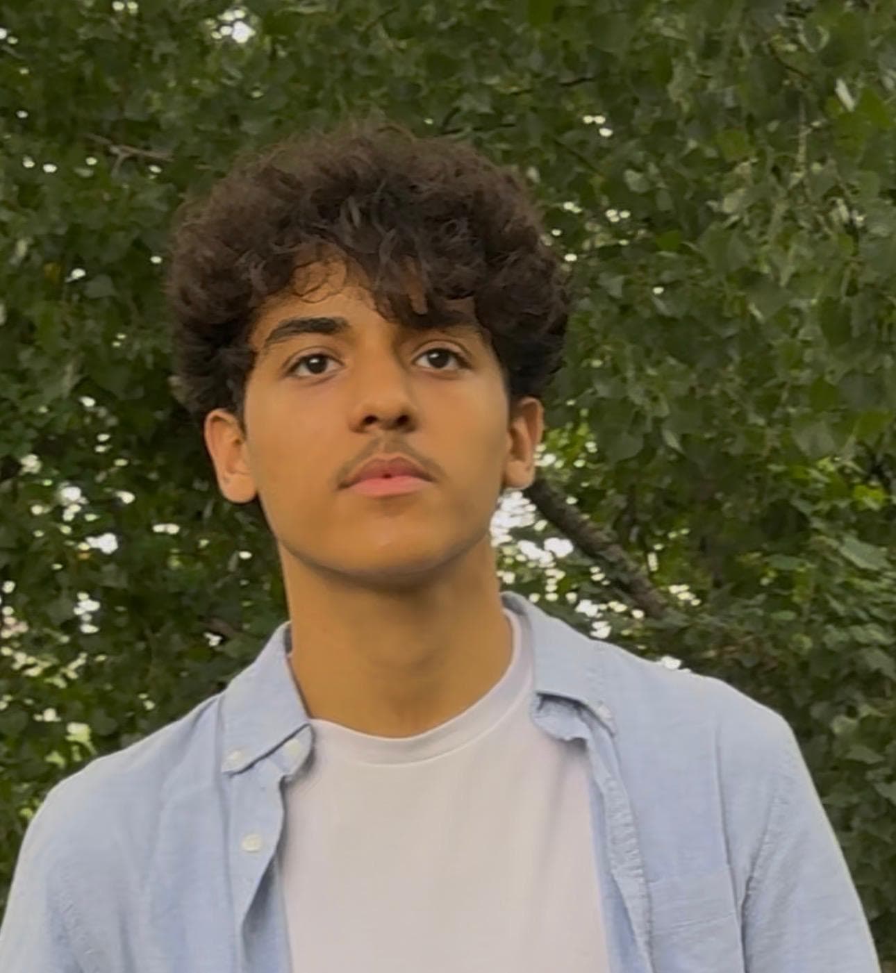 Yassen Awad outdoor portrait - Full-Stack Developer & Creative Technologist